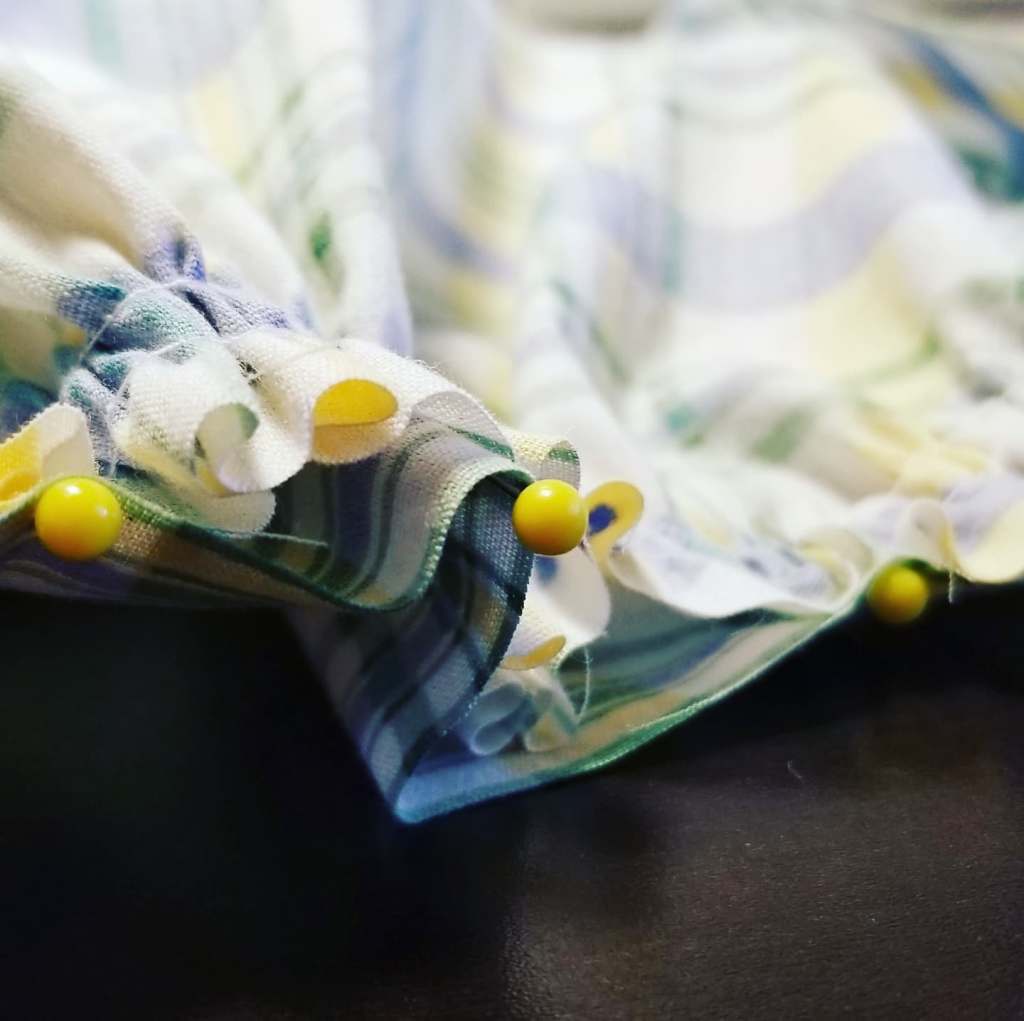 Pins in gathered material
